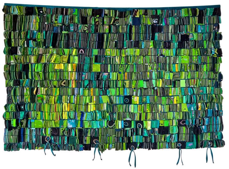 Abunanun 2 by Patrick Tagoe-Turkson: A colorful tapestry made from recycled flip-flops, reflecting Ghanaian textile patterns and addressing plastic waste
