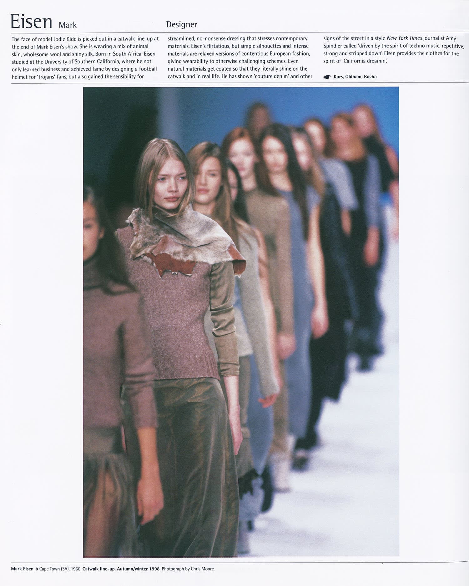A page from The Fashion Book by Phaidon showing designer Mark Eisen's clothing designs being worn by models at a fashion show. 