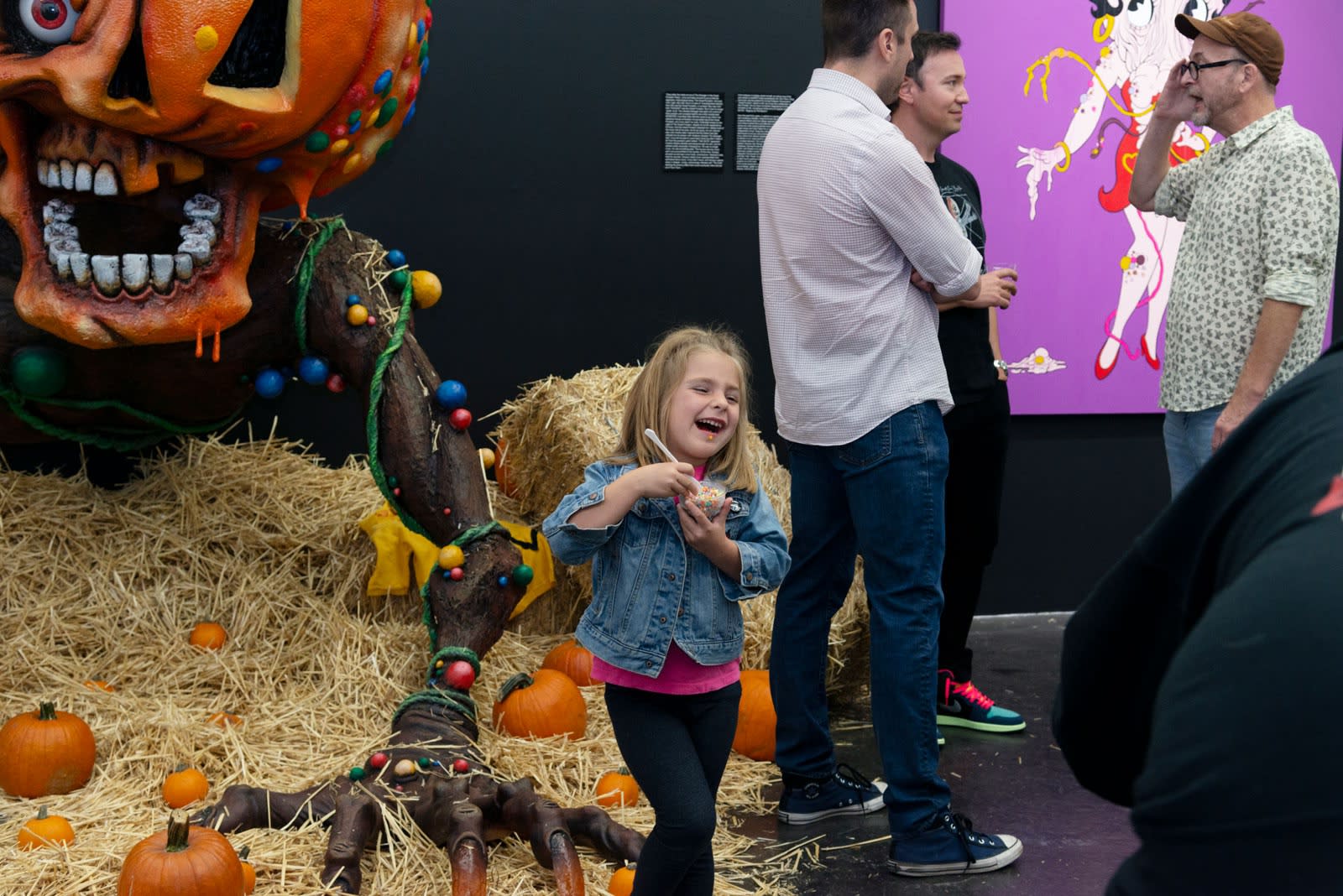 A young Alex Pardee fan enjoying Dippin' Dots in the gallery