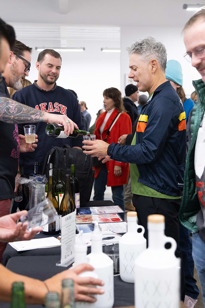 Photo from the opening reception of artist duo KeFe's opening reception for their show Music Island.