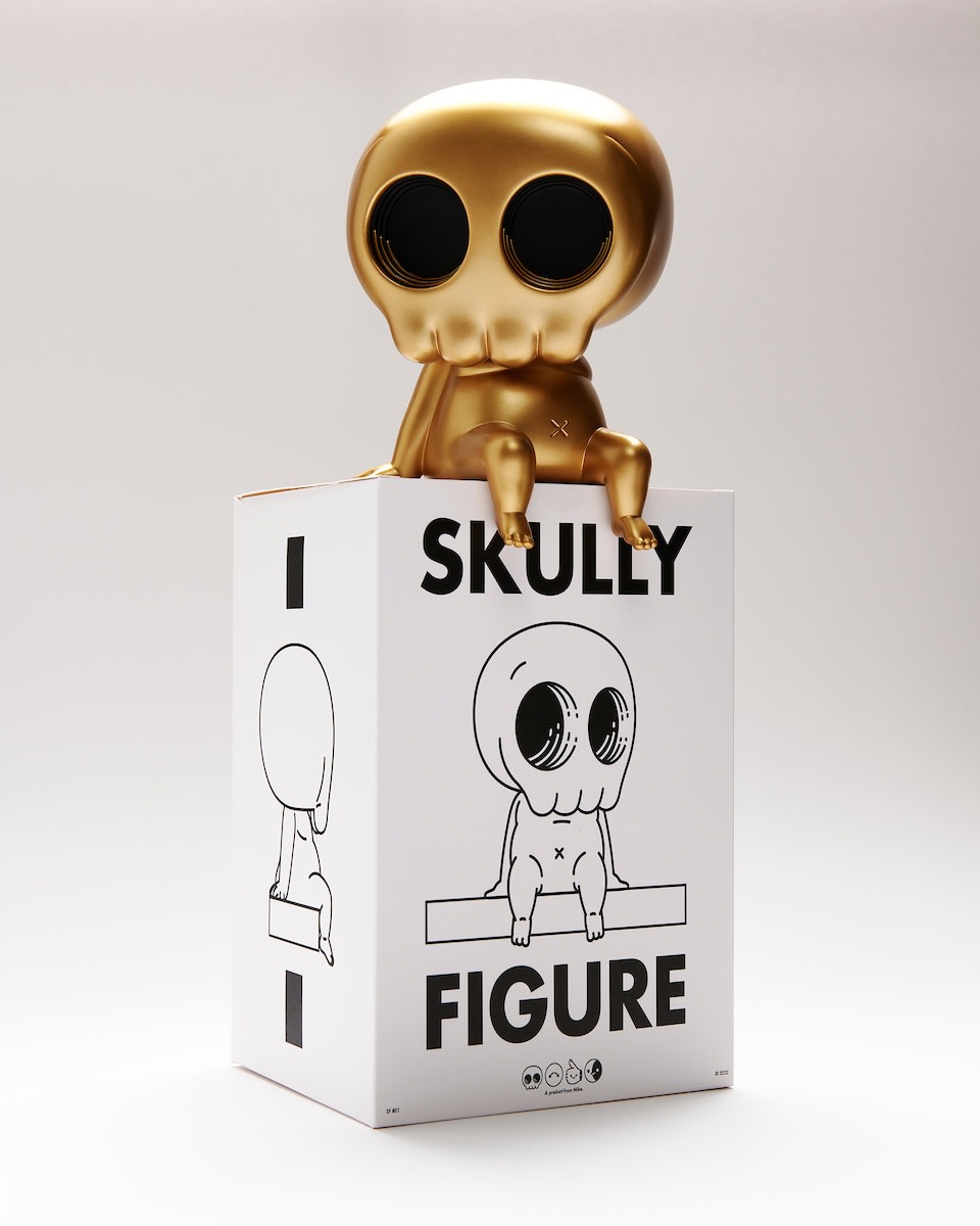 gold vinyl figure by Mike Mitchell