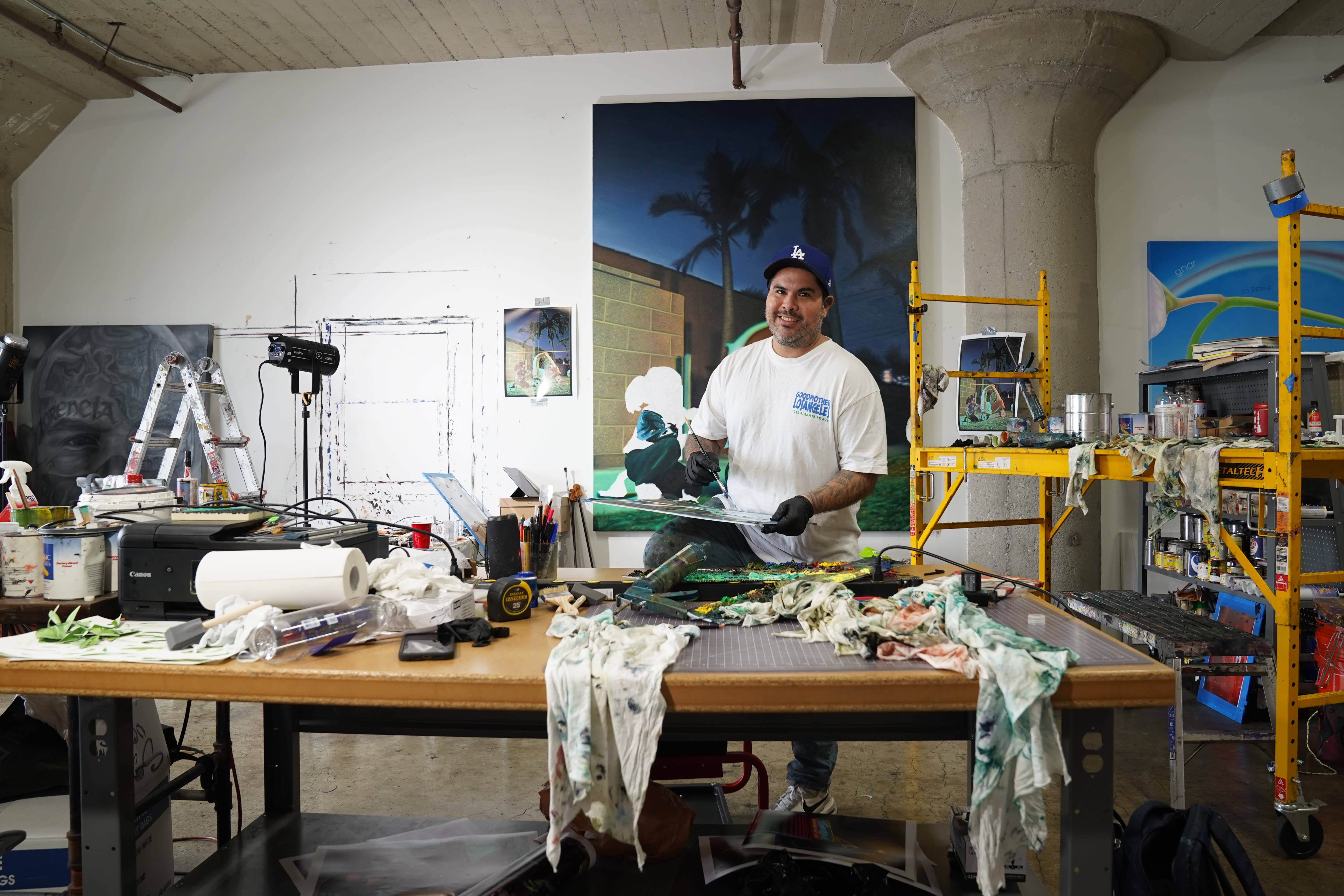 photo of the artist in their studio