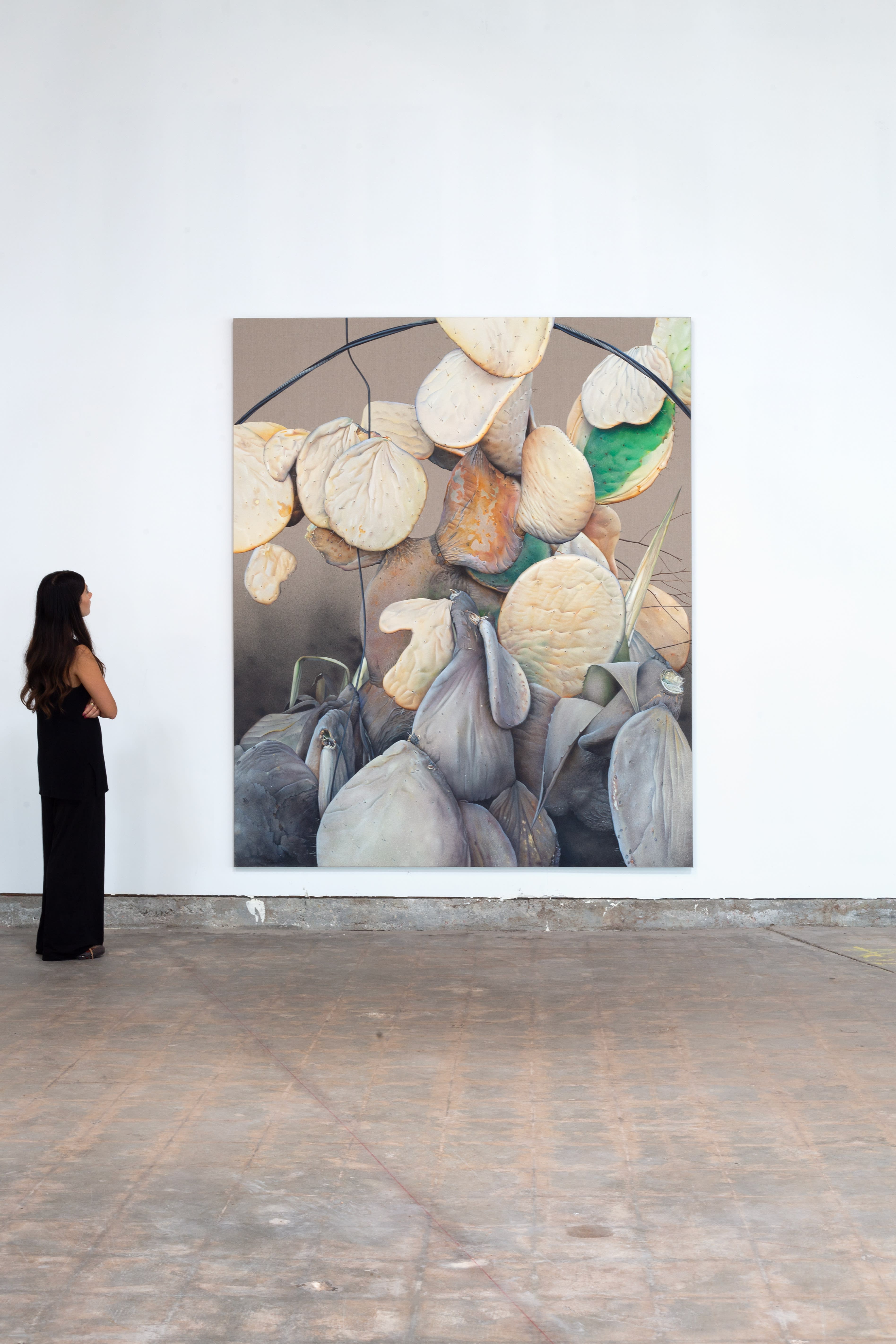 photo of the gallery with paintings hangiing on the wall