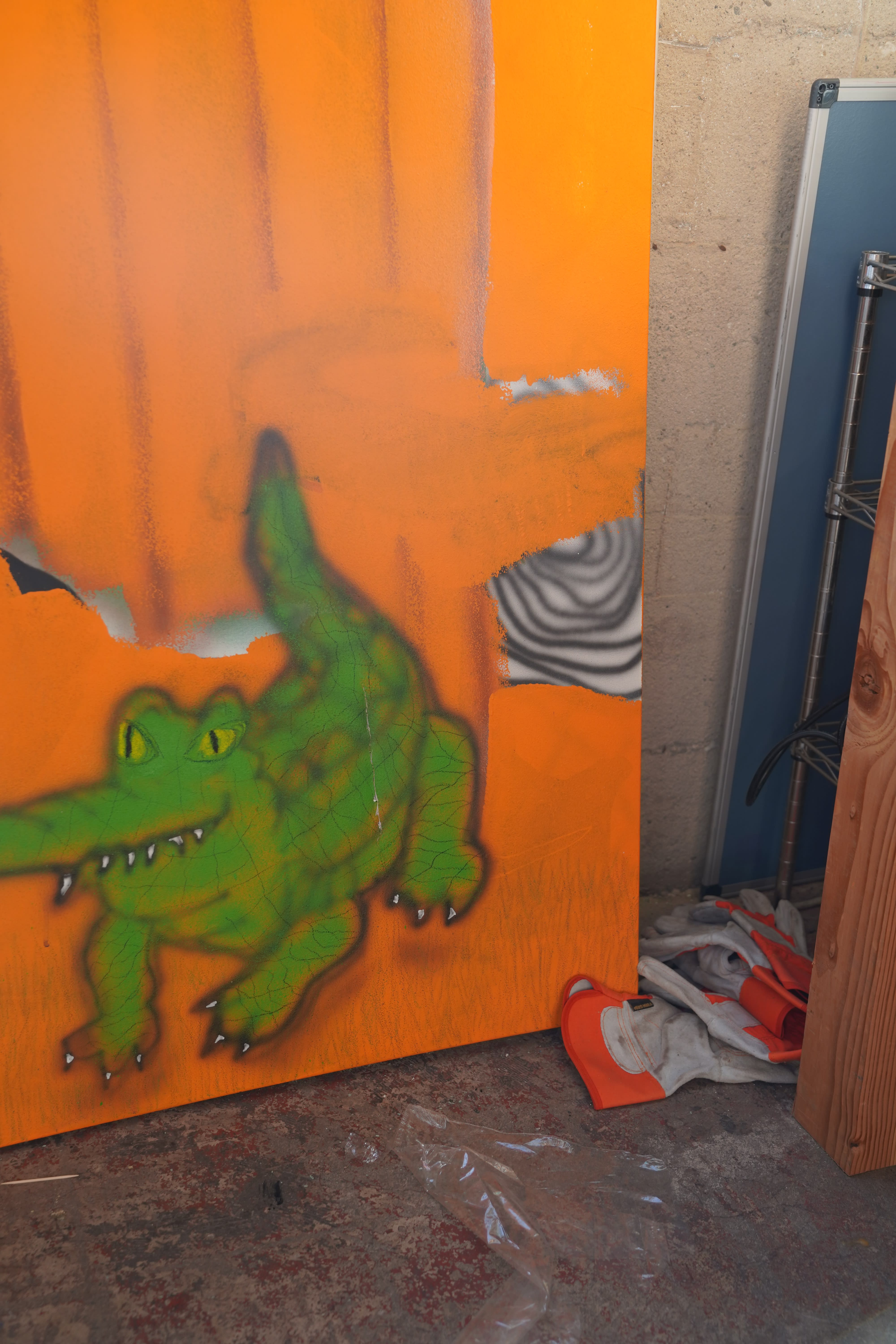 painting of an alligator in the artists studio