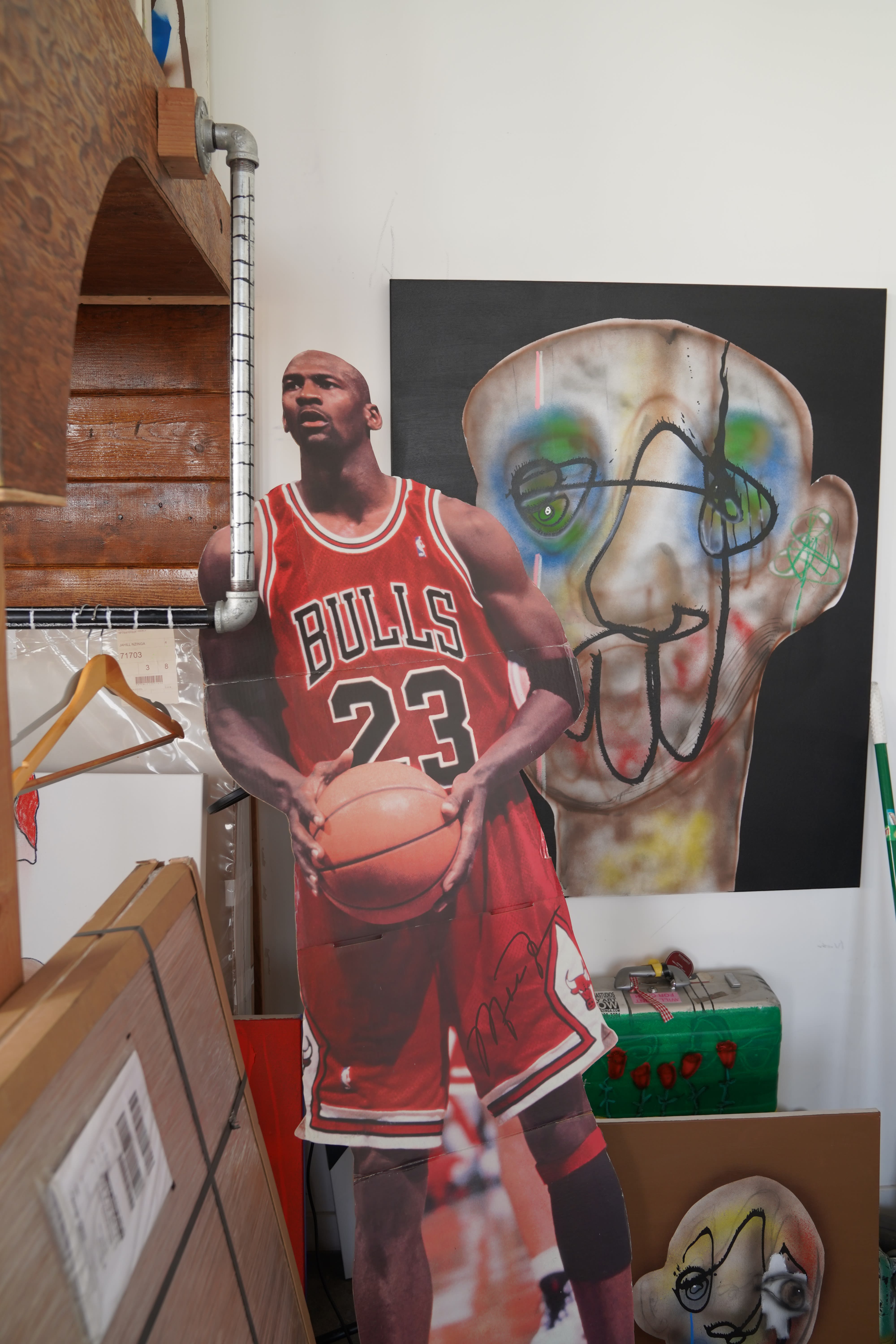 photo of a michael jordan cut out in Jahlil's studio