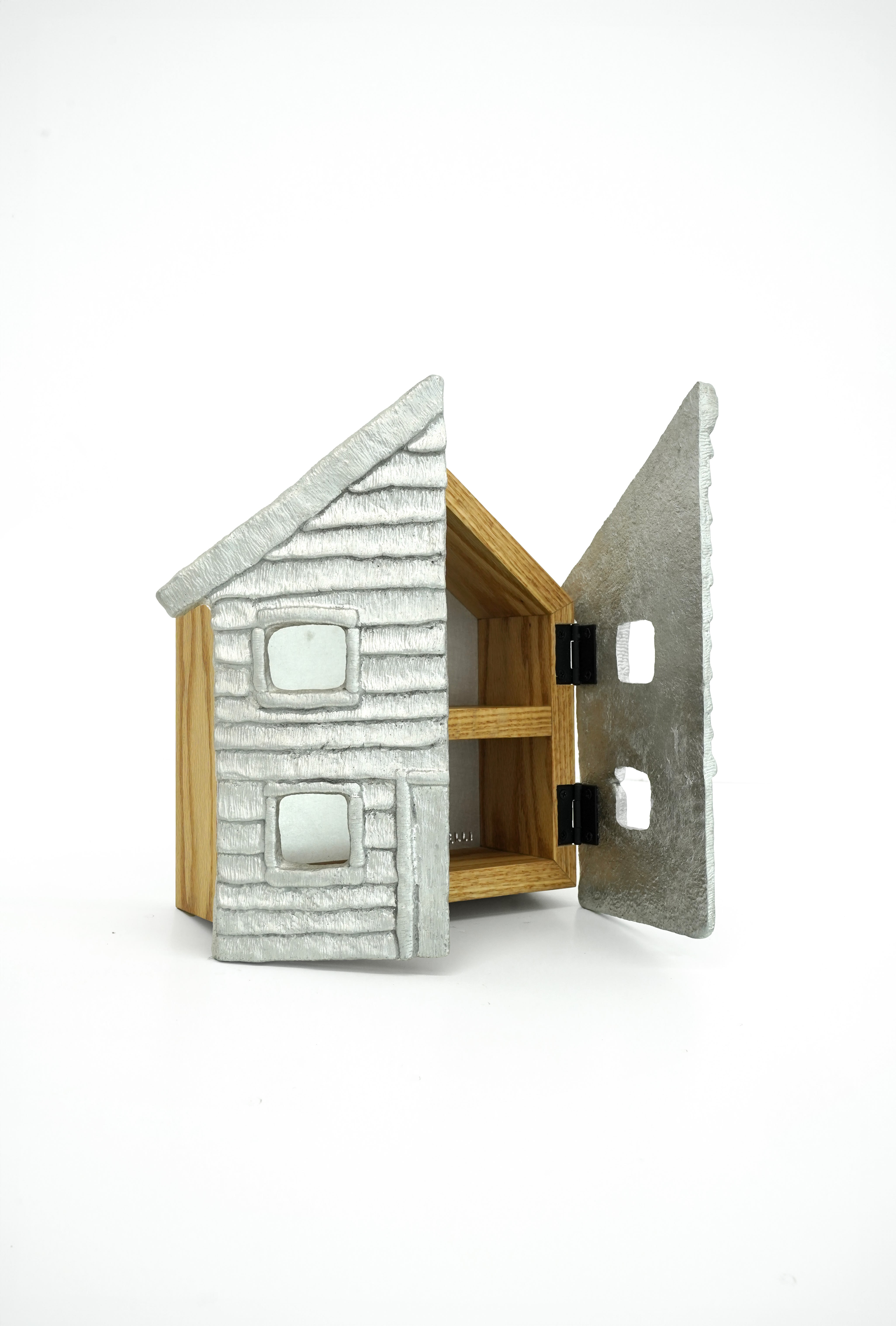 photo of a wooden house with aluminum doors