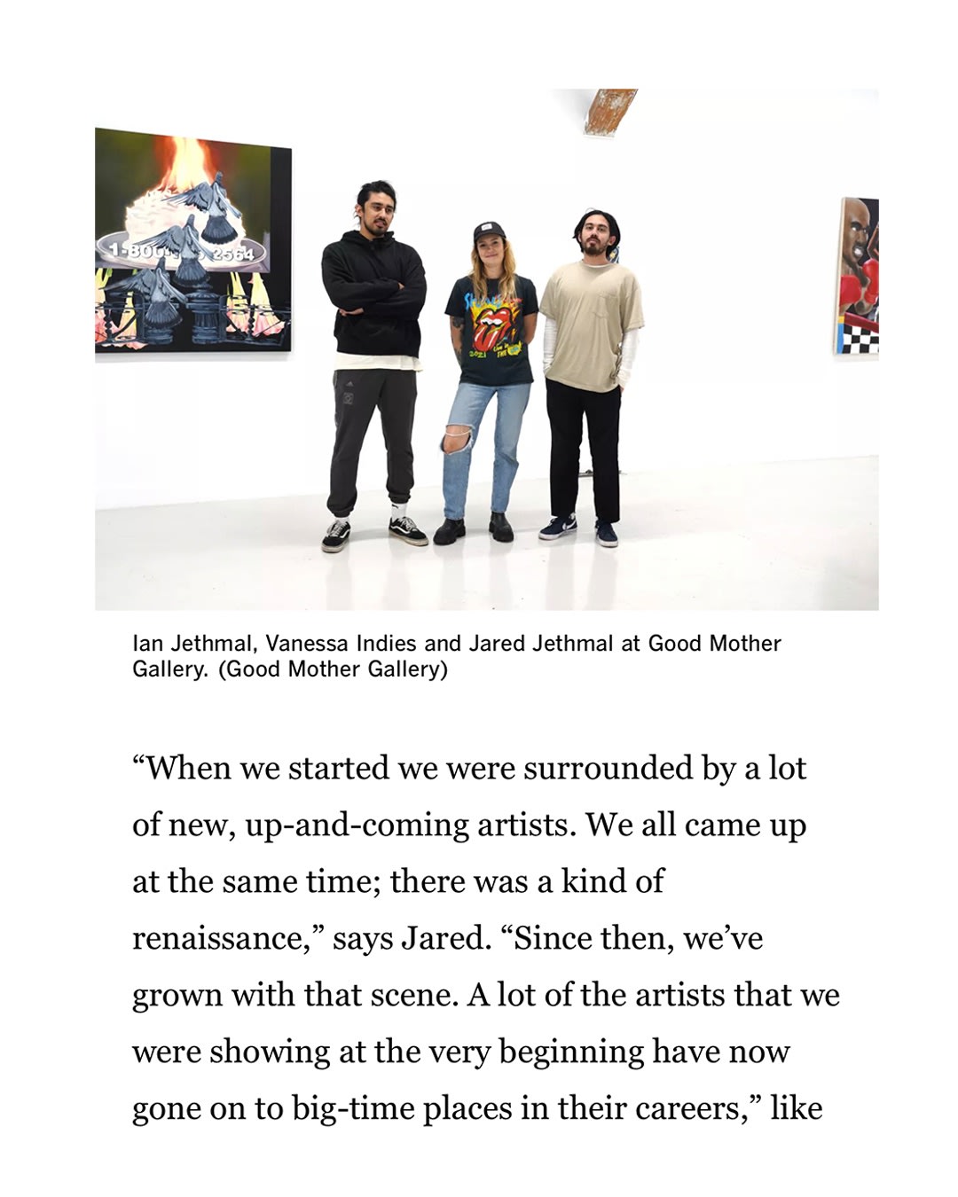 screenshot of an article with a photo of three people standing in the gallery space