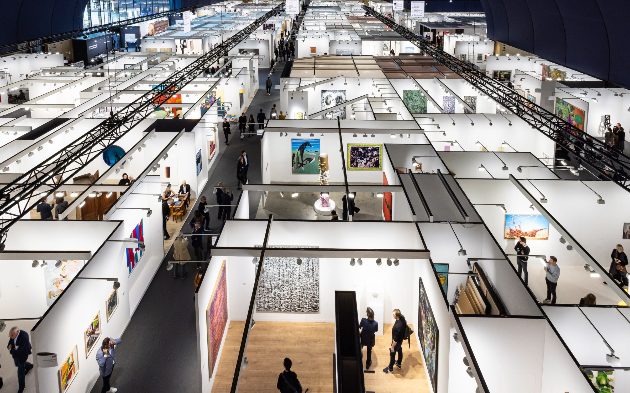 Courtesy of Art Basel, image of inside Art Basel Miami showing the different booths .