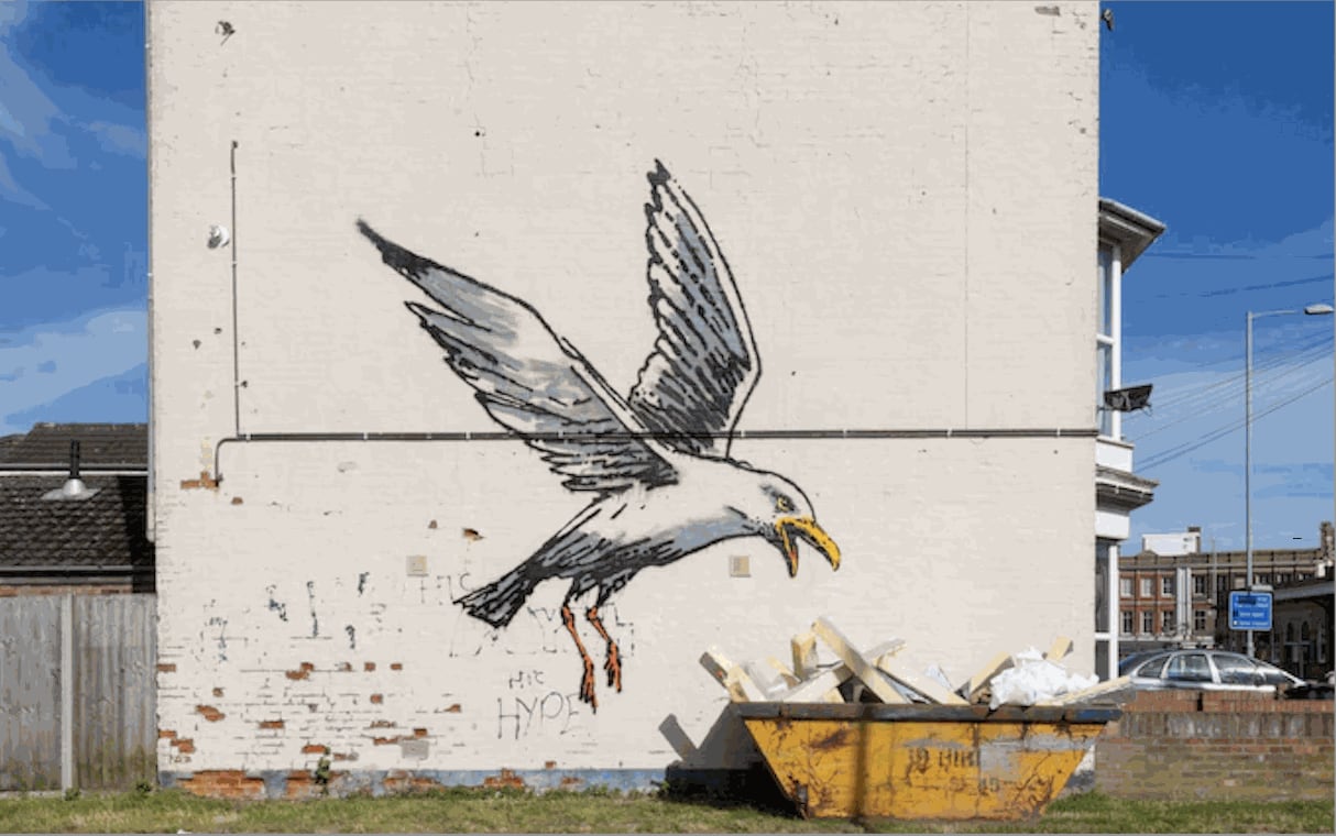 A Banksy artwork painted in the streets during the 1990s of a bird.