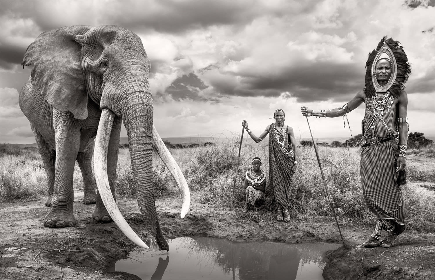 James Lewin black and white photography of Maasai people with an elephant