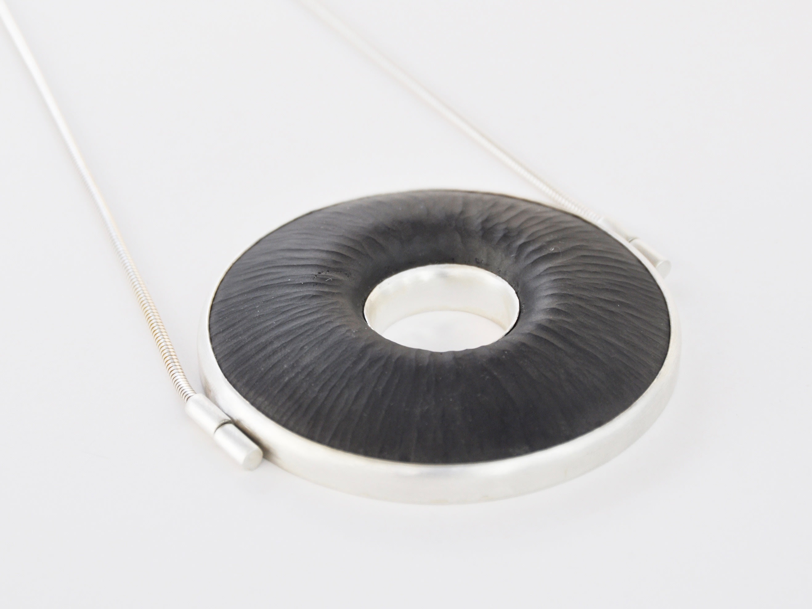 Marta Edöcs, FOCUS Necklace, cast and engraved glass, silver