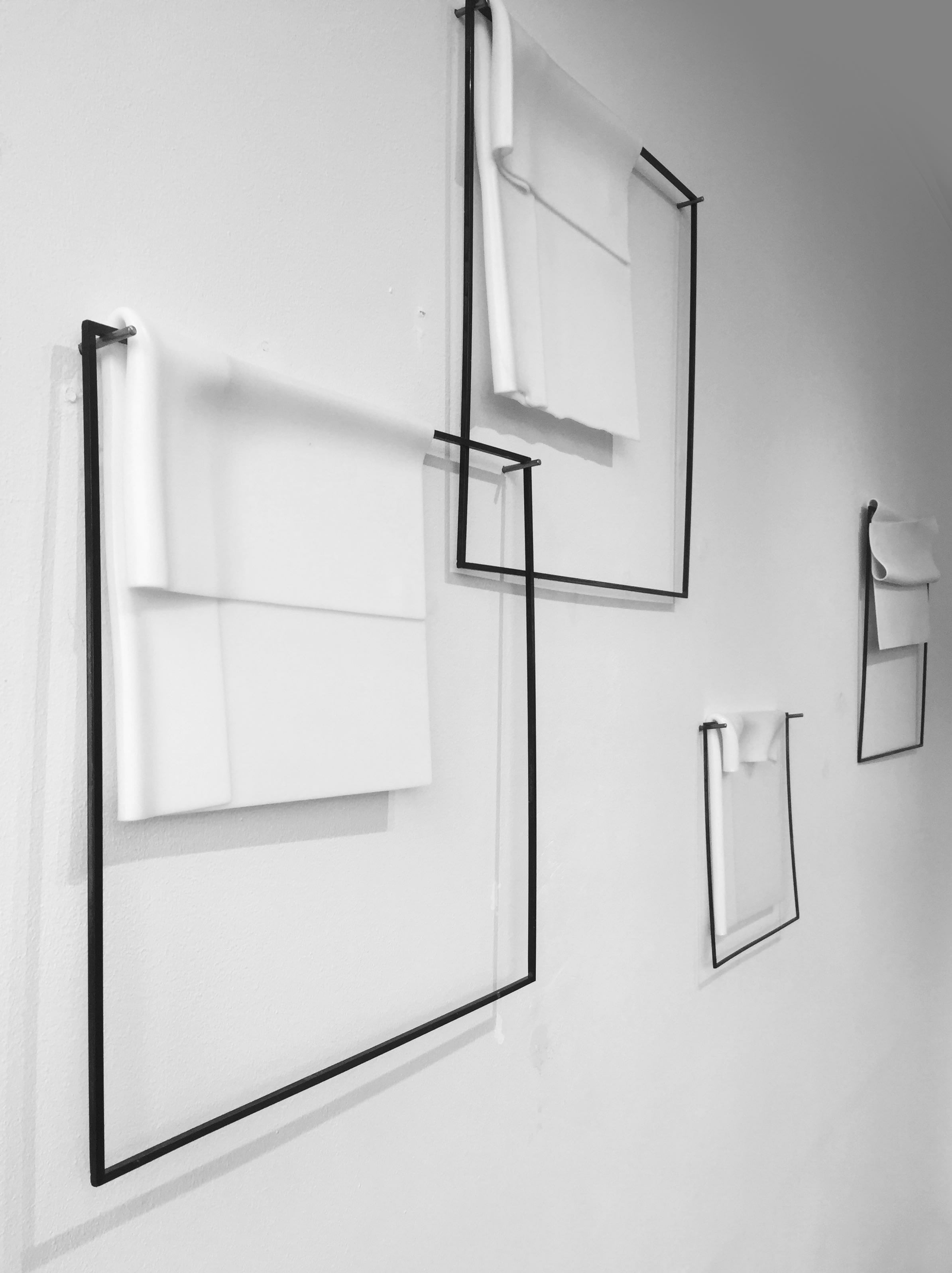 Marzena Krzemińska-Baluch, installed view of The Stijl/The Style series, 2017, kilnformed glass and metal frames.