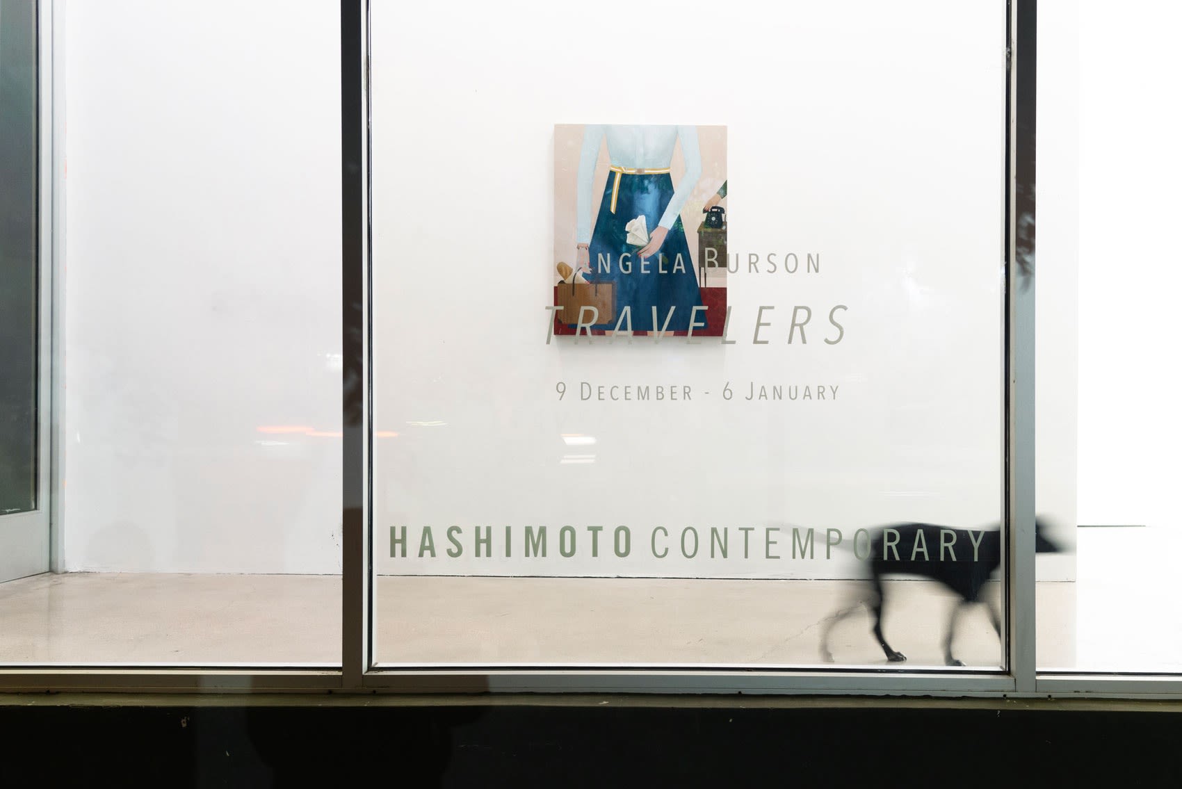 A photo from outside Hashimoto Contemporary at night time showing the title of Angela Burson's solo exhibition 