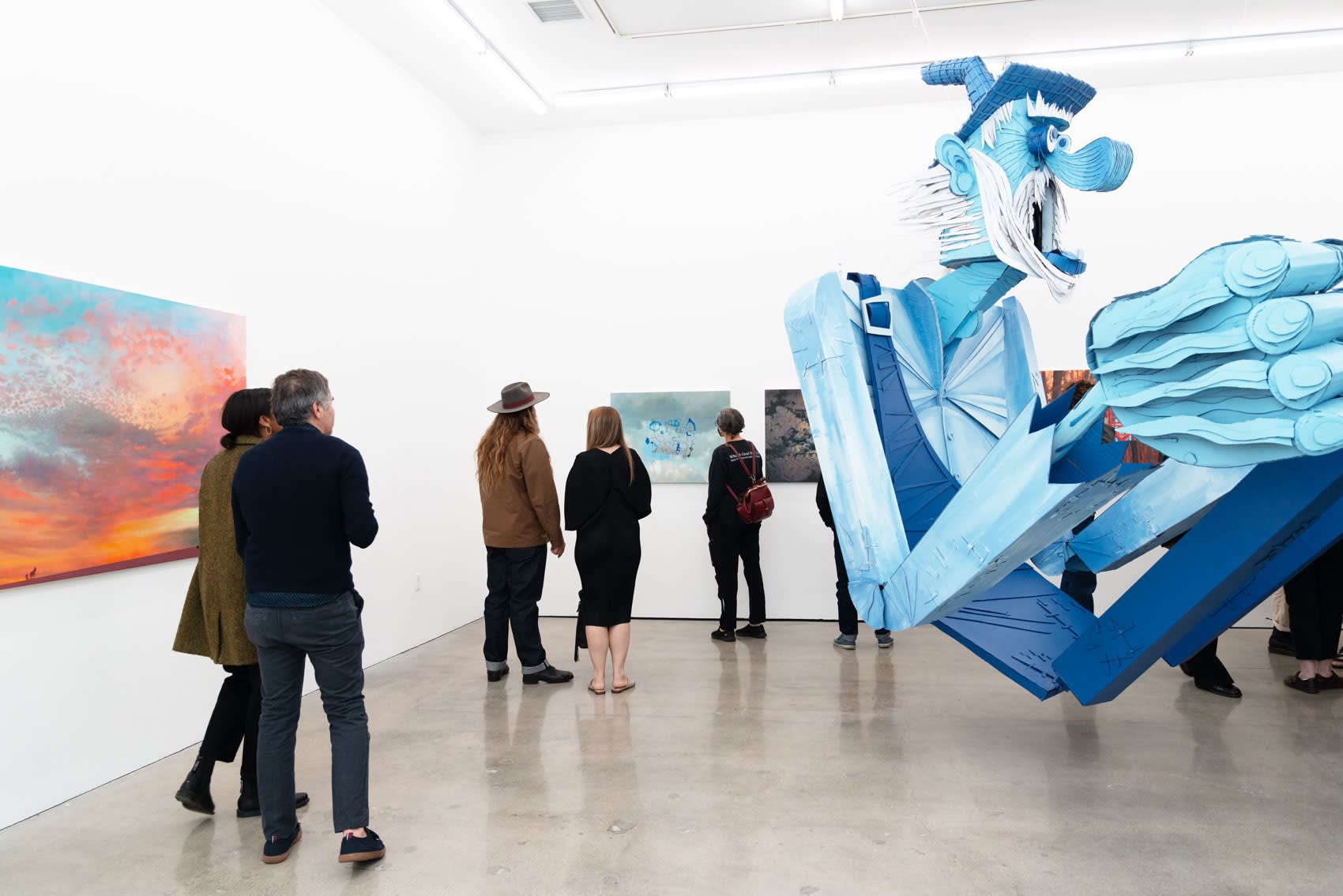 People viewing Wayne White's work at Hashimoto Contemporary Los Angeles