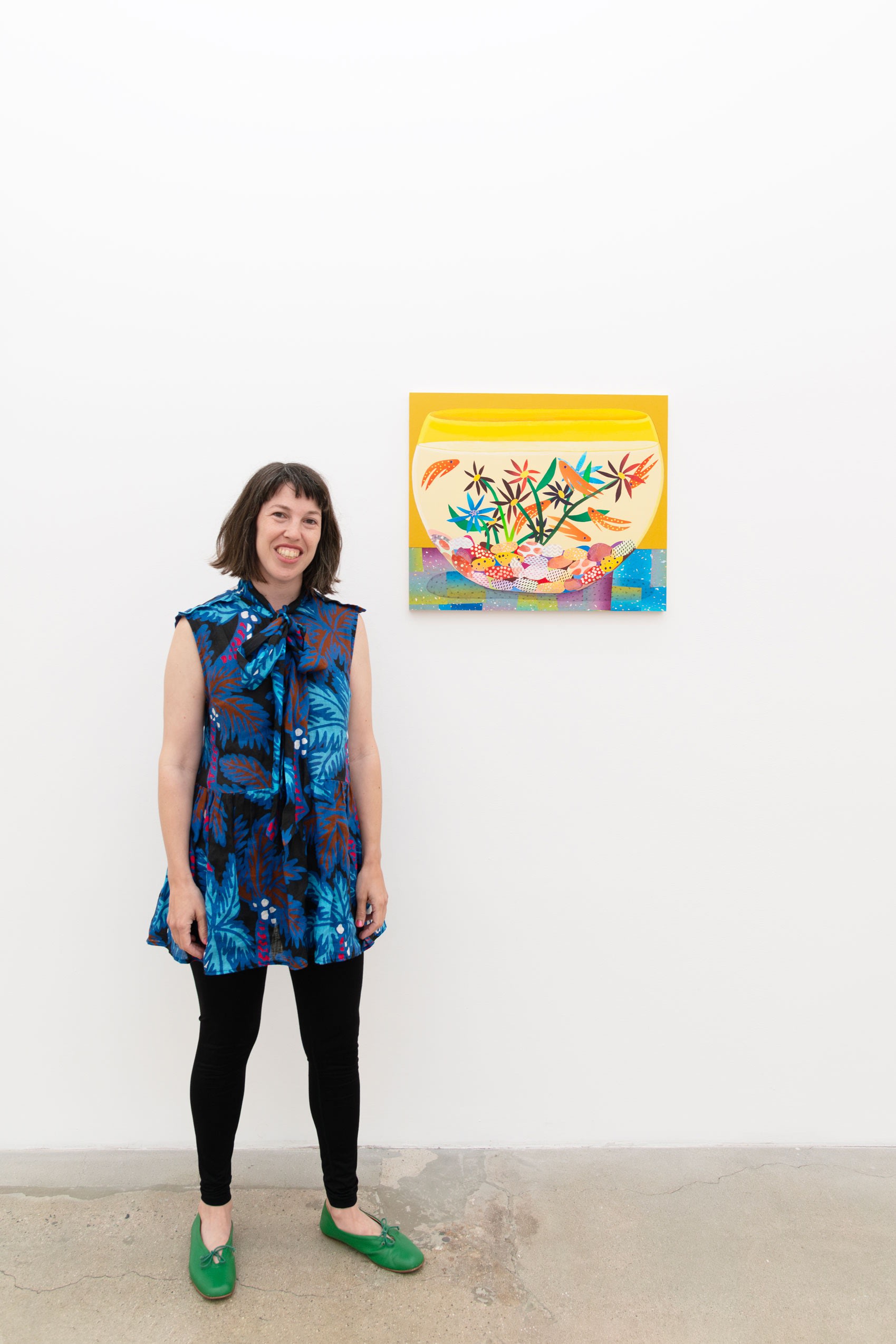 Karen Lederer with her painting at the opening reception of Pith at Hashimoto Contemporary 