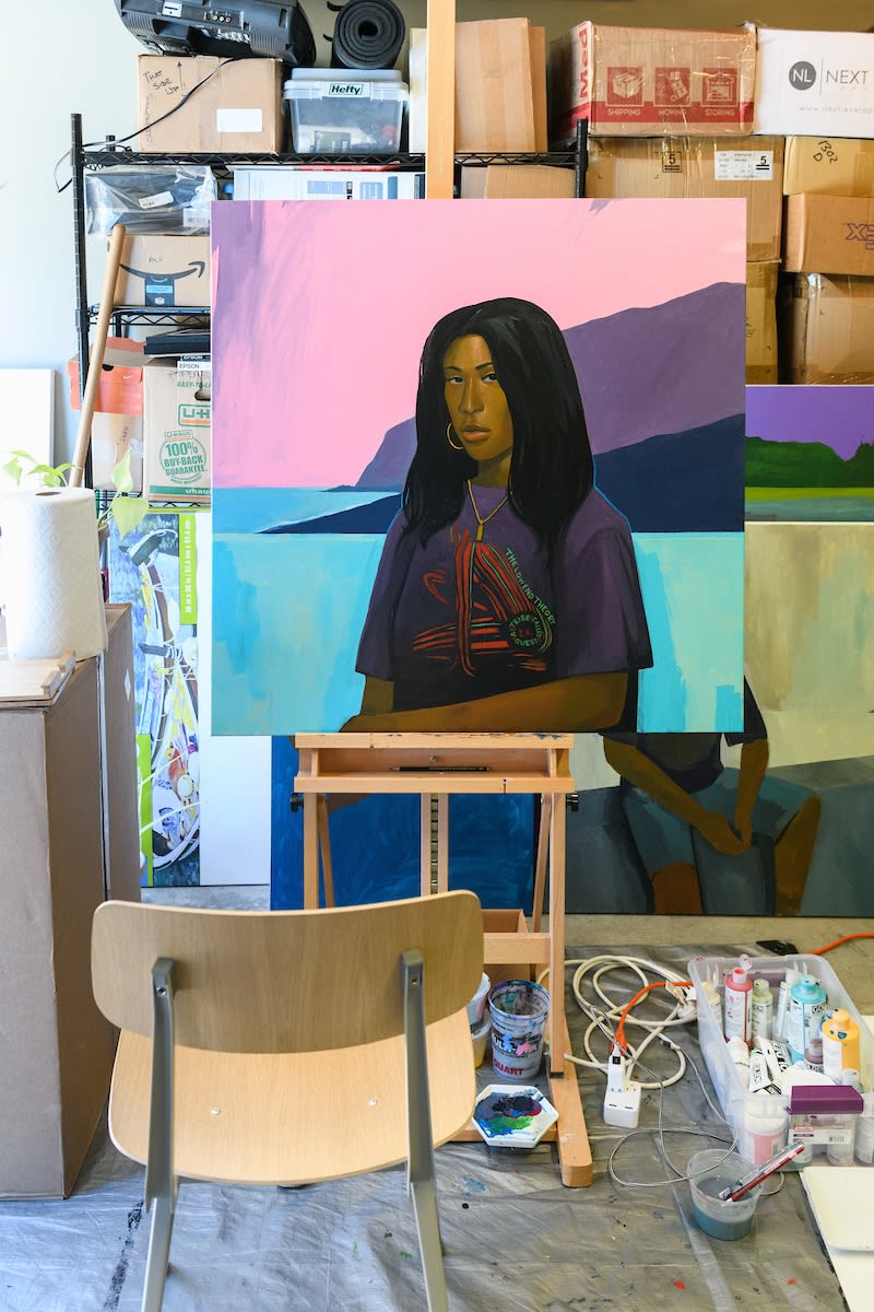 Dennis Brown's painting sitting on an easel in his studio