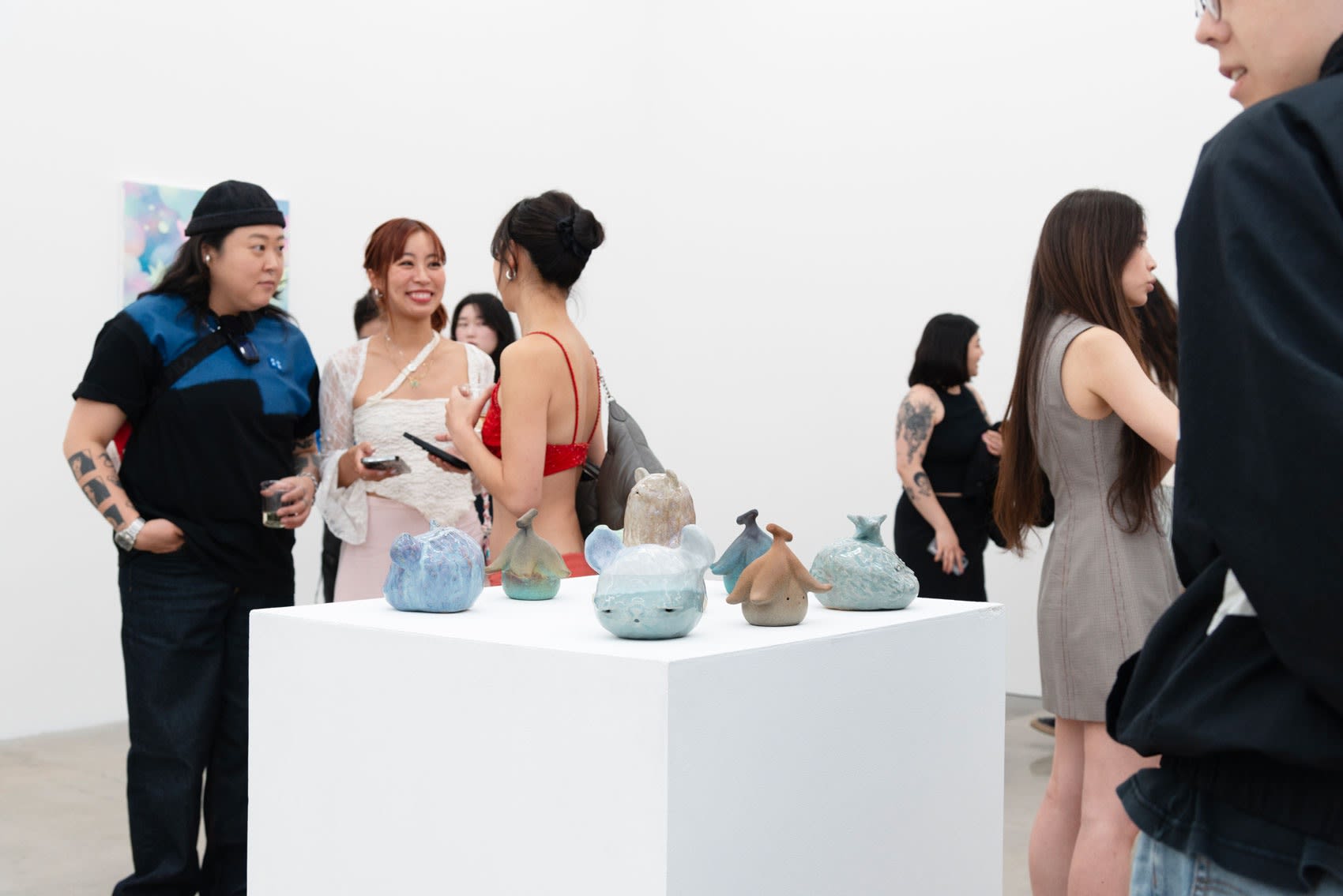 Visitors mingle at the So Youn Lee opening Anomaly