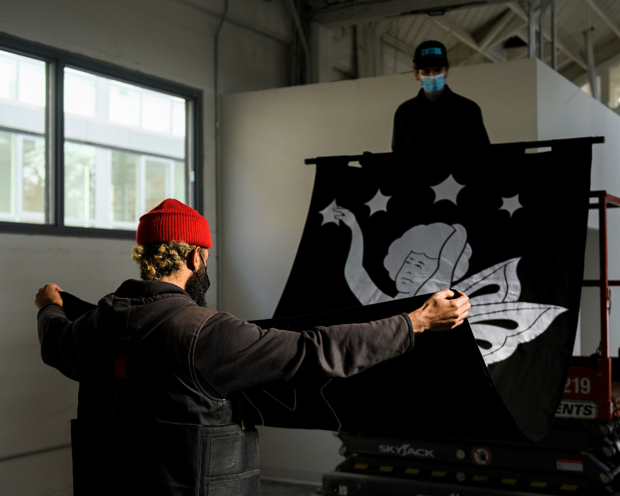 artist chris martin in front of his artwork at the ICA San Francisco