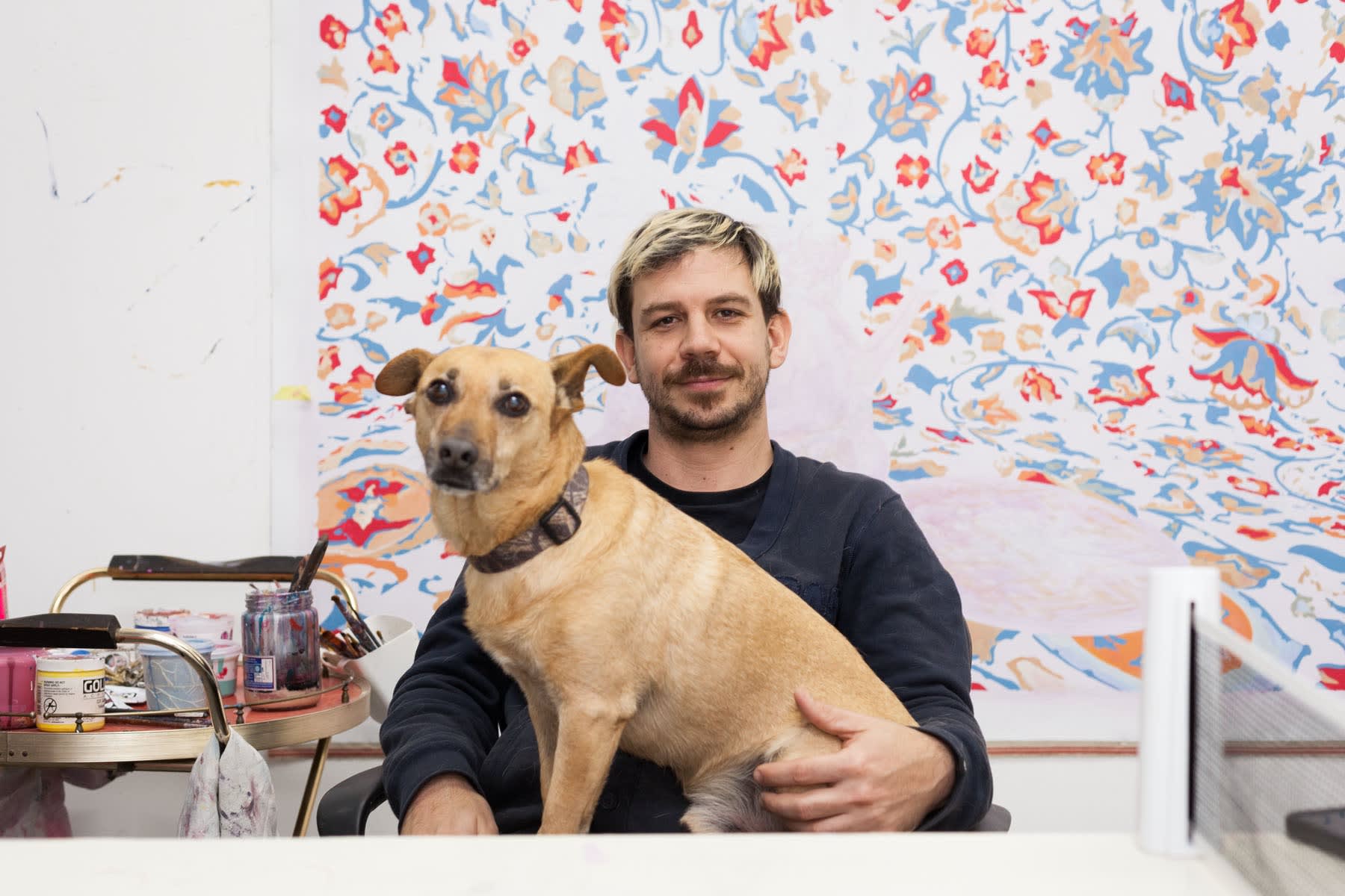 Francisco Diaz Scotto and his dog in the studio 