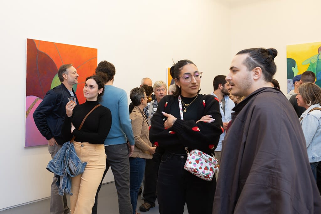 group of people at Genevieve Cohn opening night reception