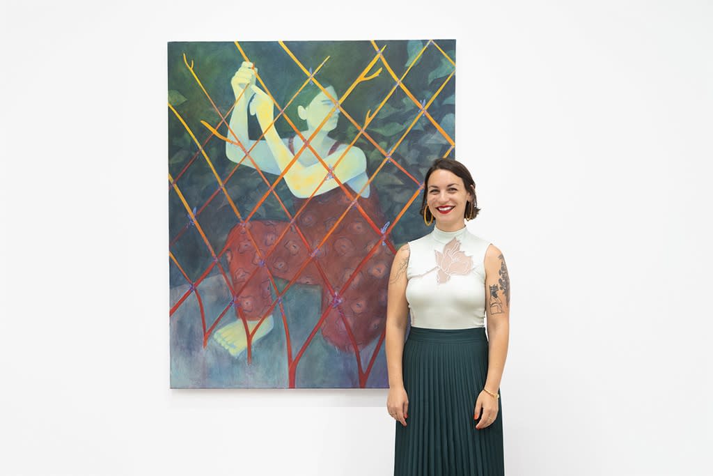 Image of artist Genevieve Cohn at the opening reception of her exhibition