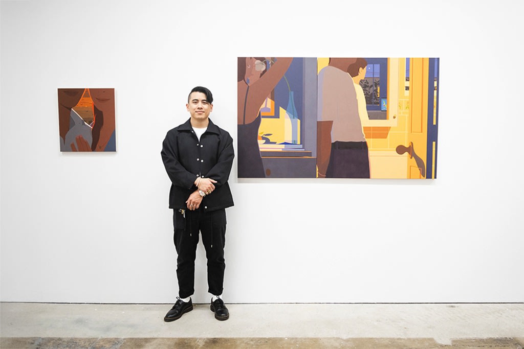 Photograph of artist Adrian Kay Wong at the opening reception of his latest solo exhibition