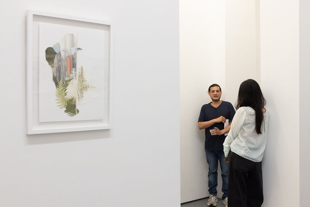 people talking at the opening of Gregory Euclide's Assembled Lands