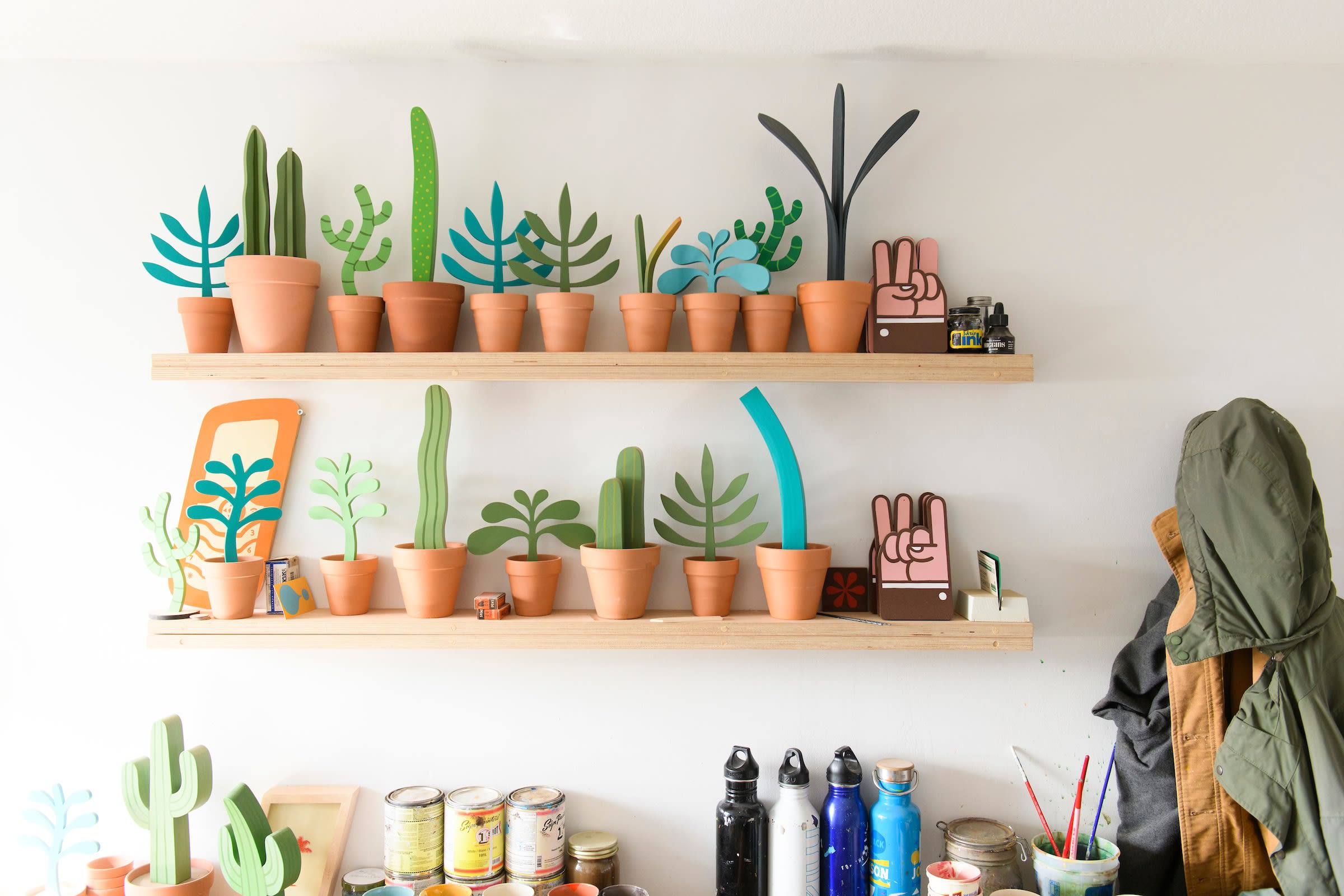 photo of jeff canhams studio with wooden plants on shelves