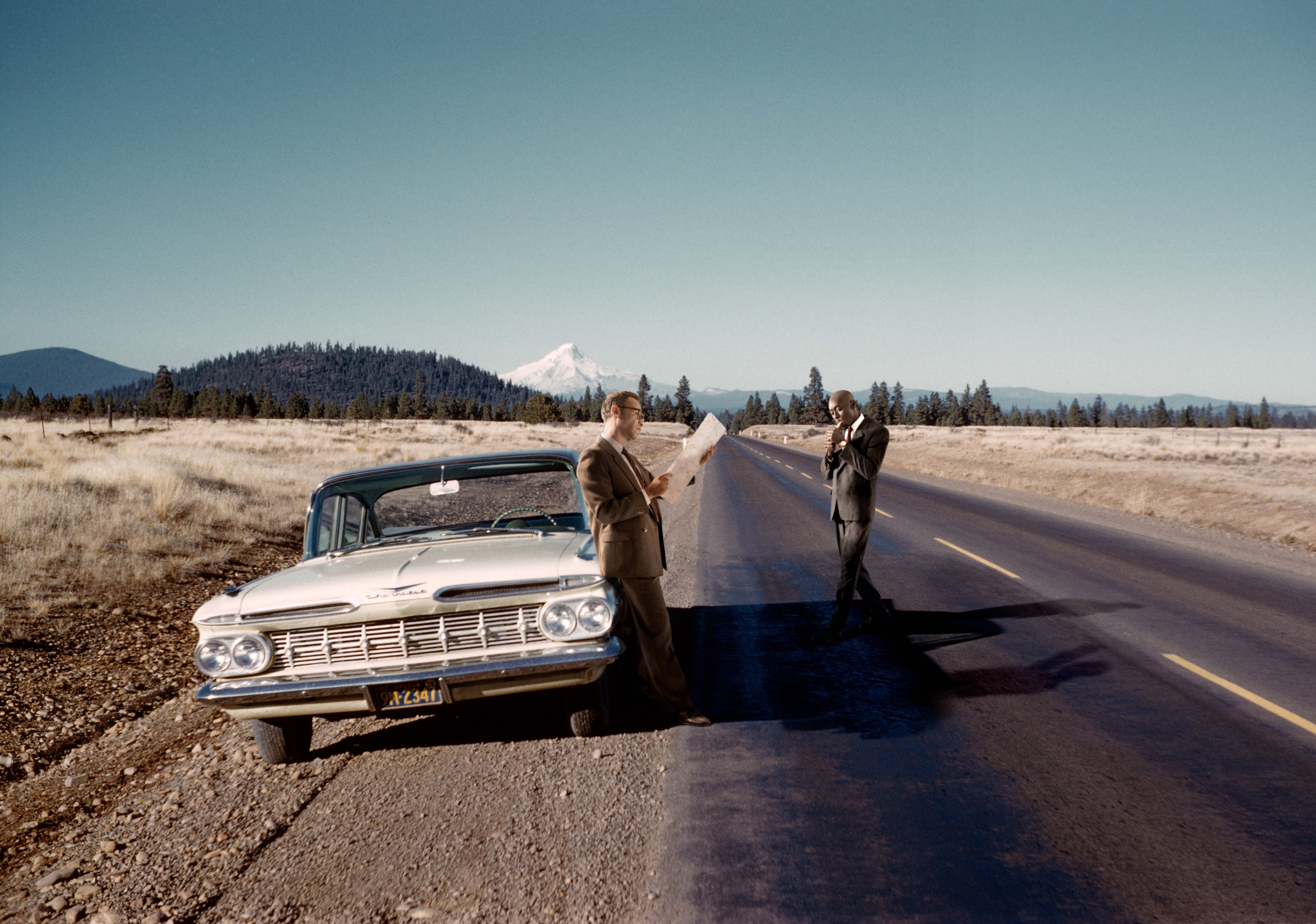photograph of Lee Shulman and Omar Victor Diop inserted into vintage slide with car and road