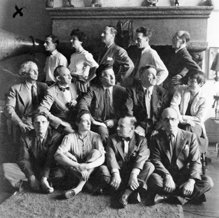 Artists in Exile group photo, New York, 1942. Left to right, first row: Stanley William Hayter, Leonora Carrington, Frederick Kiesler, Kurt Seligmann; second row: Max Ernst, Amédée Ozenfant, André Breton, Fernand Léger, Berenice Abbott; third row: Jimmy Ernst, Peggy Guggenheim, John Ferren, Marcel Duchamp, Piet Mondrian.