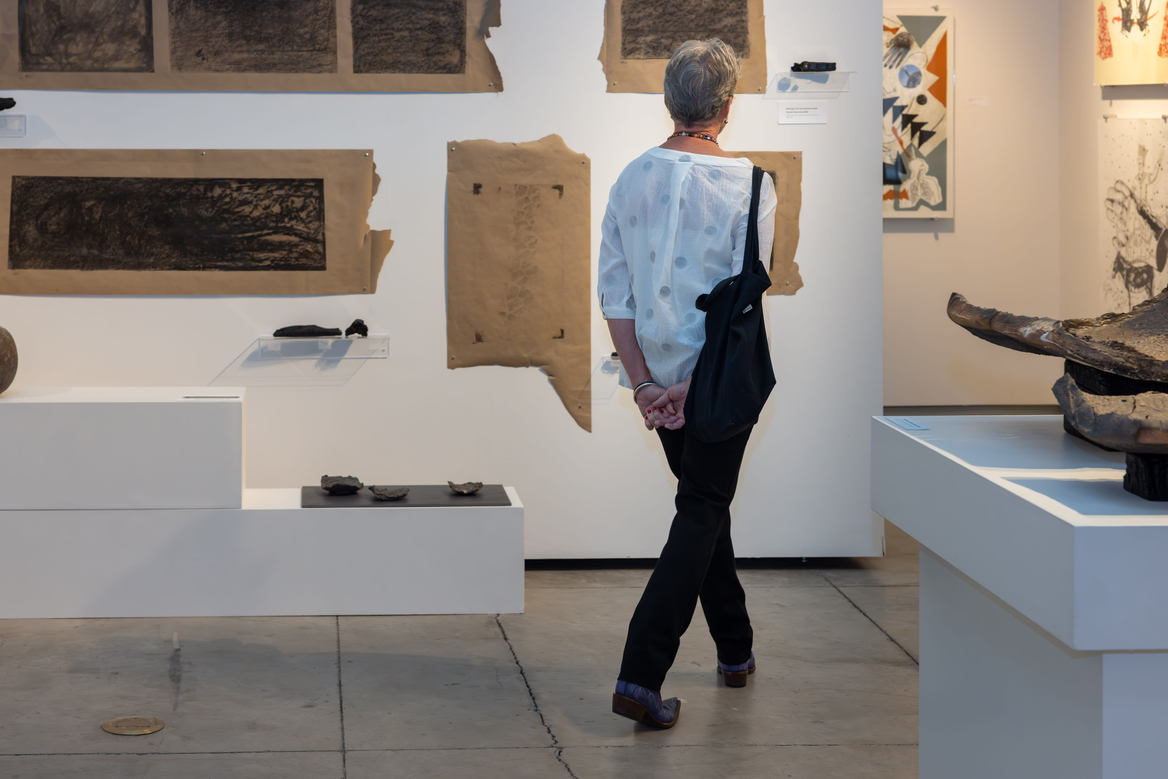 Person looking at art