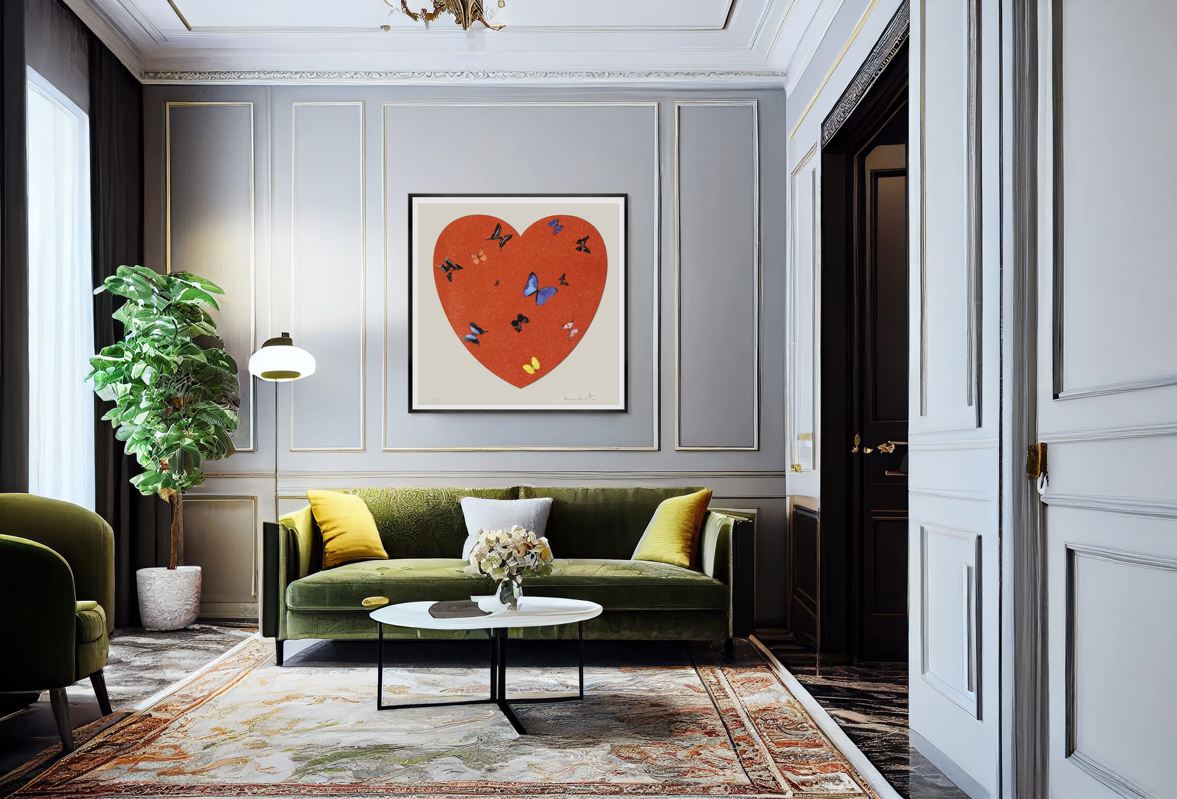 A painting from the Love Heart series by Damien Hirst hangs on a living room wall. Enjoying this artwork every day is one of the great joys and benefits of investing in art.