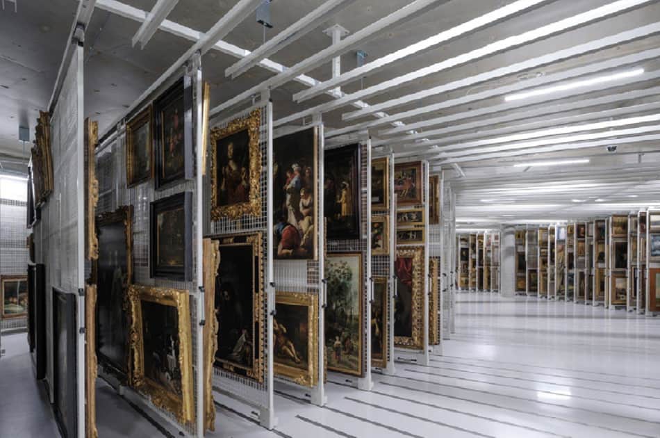 If you invest in paintings, you need a good storage facility such as this one, or you can display them on your wall, one of the benefits of investing in art.