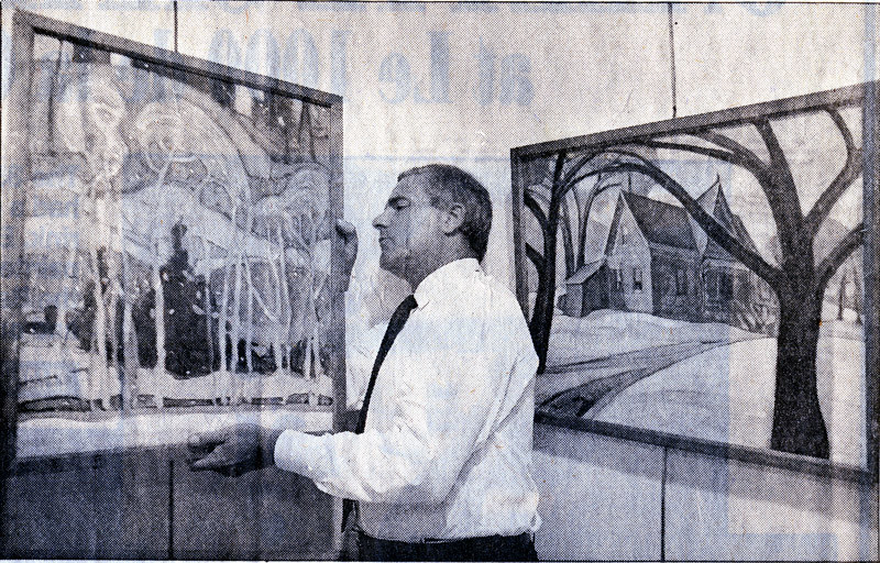 Eric Klinkhoff holds Anne Savage painting 