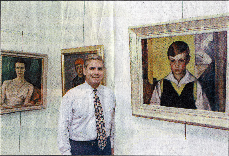 Eric Klinkhoff with portraits by Lilias Torrance Newton. (Gazette Photo)