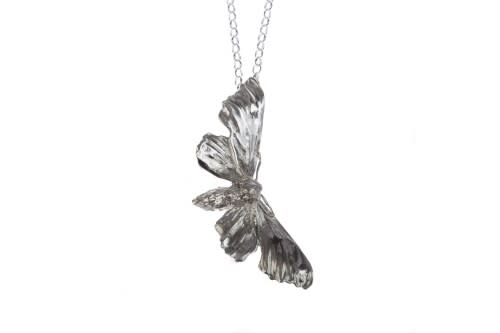 Lucy Jade Sylvester silver necklace with large Hawk Moth pendant attached by the wing