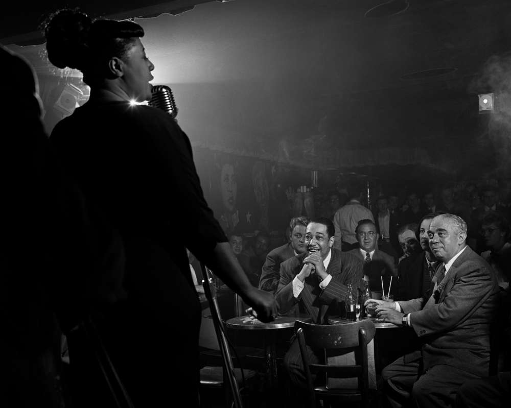 Herman Leonard, Ella Fitzgerald with Duke Ellington, Benny Goodman and Richard Rogers, Downbeat, New York City, (ELF03), 1948