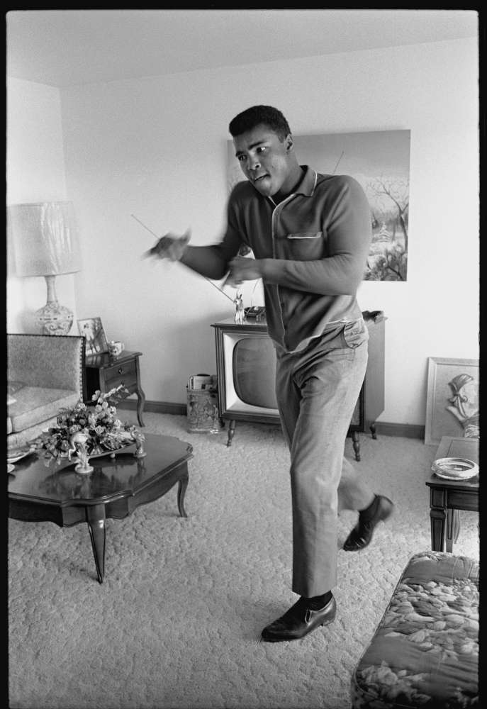 Steve Schapiro, Muhammad Ali Shadowboxing at His Parent's House, Louisville, Kentucky, 1963