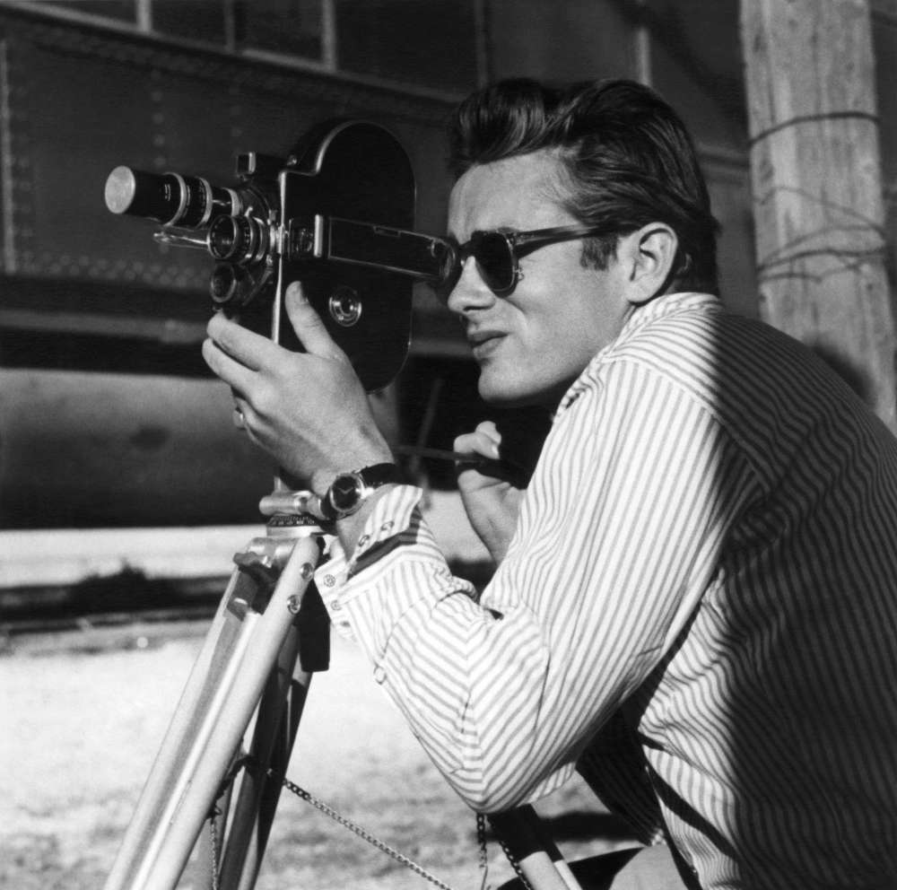 Sid Avery, James Dean Close up with a Bolex Camera on the Set of "Giant", 1955