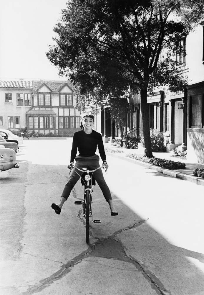 Mark Shaw, Audrey Hepburn on bicycle. Photographed for the December 1953 issue of LIFE, 1953