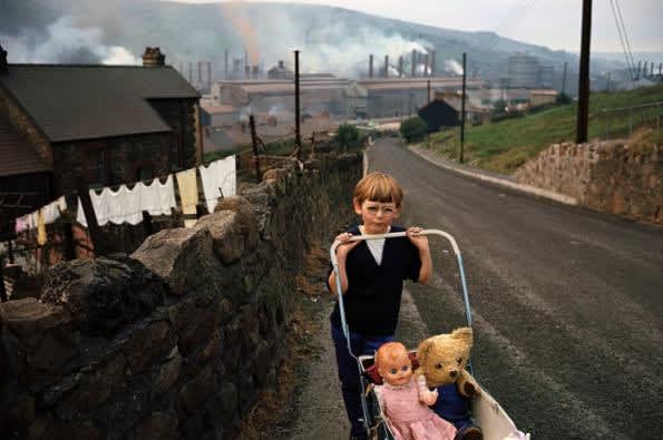 Bruce Davidson, Wales (boy pushing carriage), 1965
