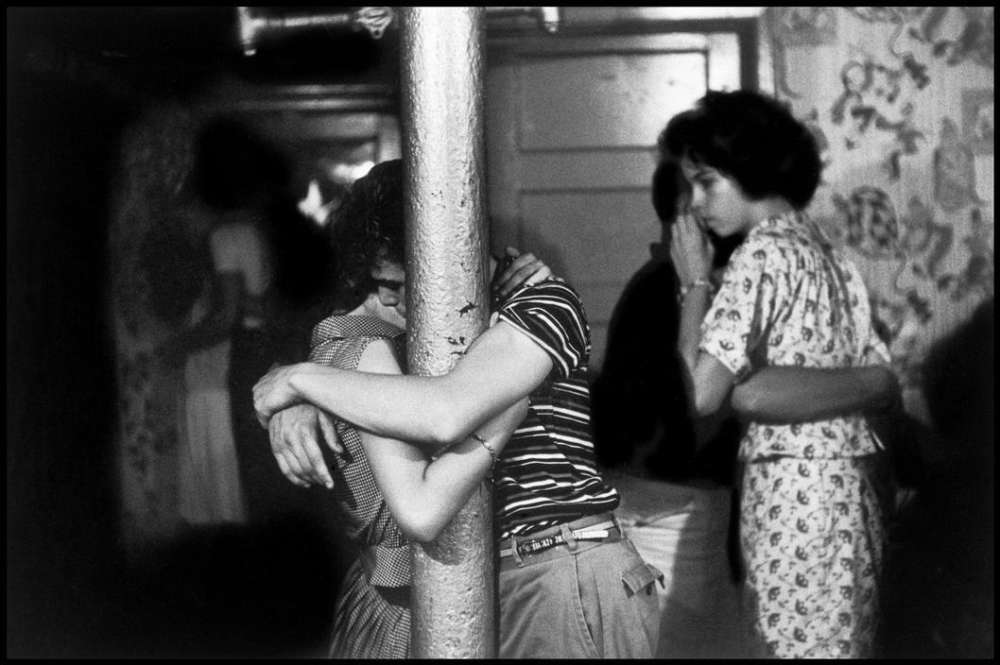 Bruce Davidson, Brooklyn Gang (couple dancing with arms around pole), 1959