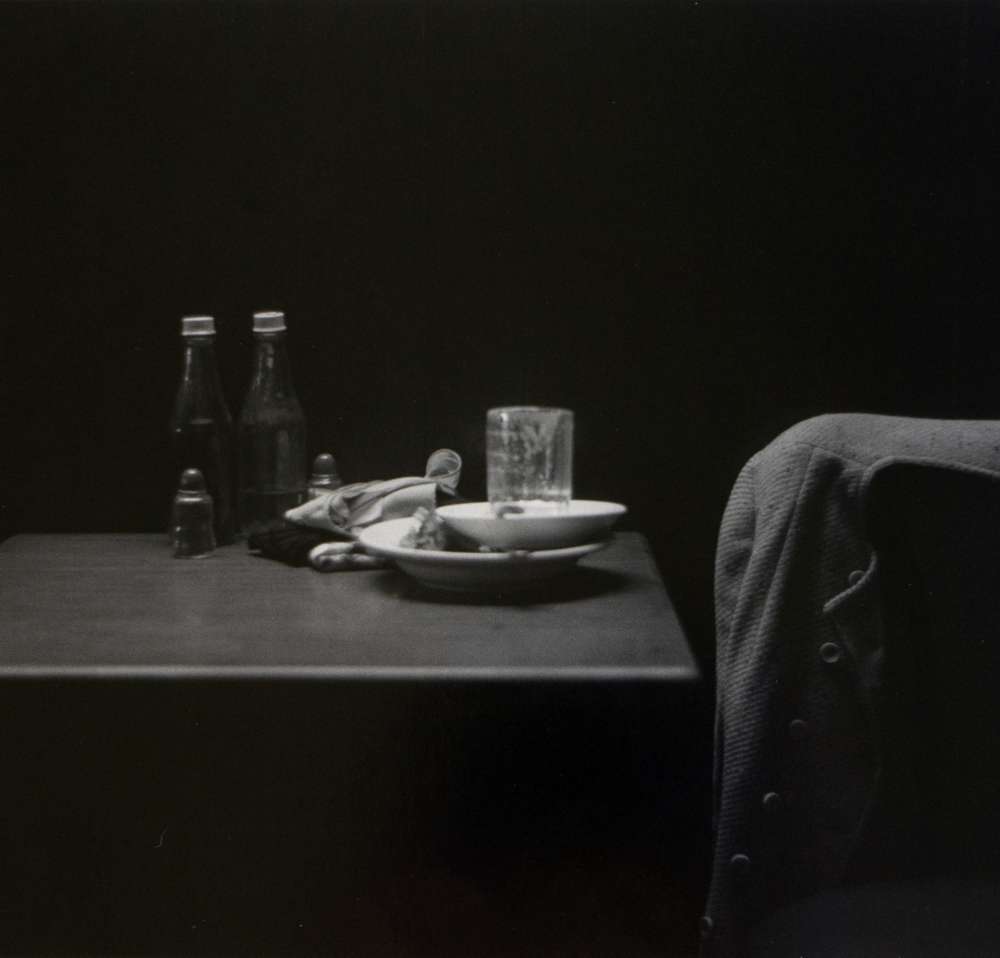 Roy DeCarava - Catsup Bottles, Table and Coat, New York