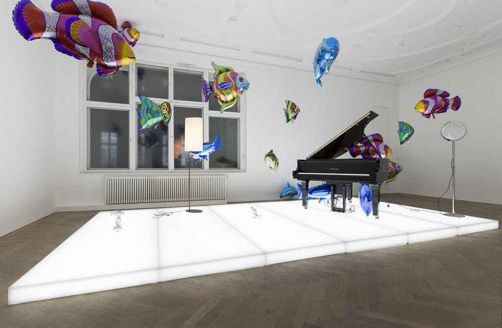 Philippe Parreno, Quasi Objects: My Room is a Fish Bowl, AC/DC Snakes,  Happy Ending, Il Tempo del Postino, Opalescent acrylic glass podium,  Disklavier Piano, 2014 | Esther Schipper