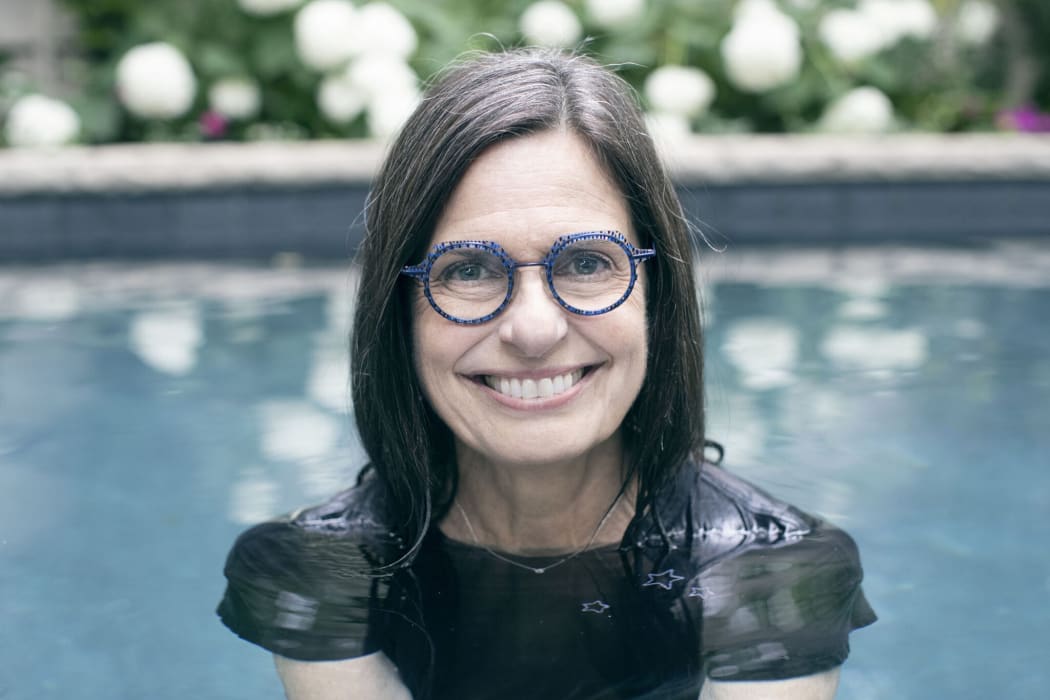 Barbara Cole headshot of her in water.