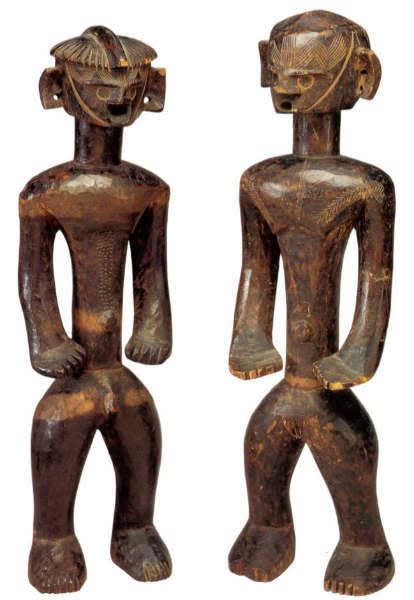 Angas figures. Height: 53,3 & 55,9 cm. Image courtesy of the Fine Arts Museum of San Francisco, The de Young Museum, San Francisco, CA., USA (#1996.12.34.1 & 2).