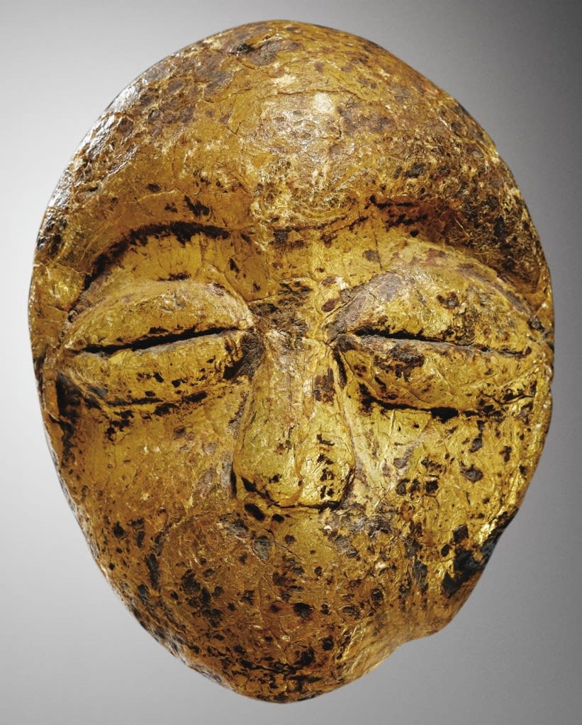 Lega copal resin miniature mask. Height: 9 cm. Africarium Collection. Image courtesy of Sotheby’s.