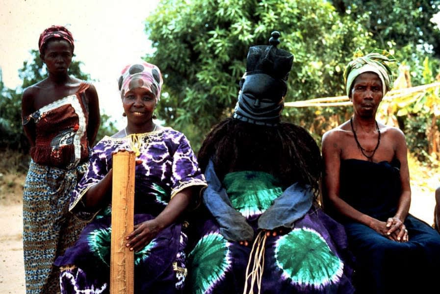 A sowei in costume with attendants, Njahindama, Kakua, Bo, Sierra Leone. Photo courtesy of Ruth Phillips.