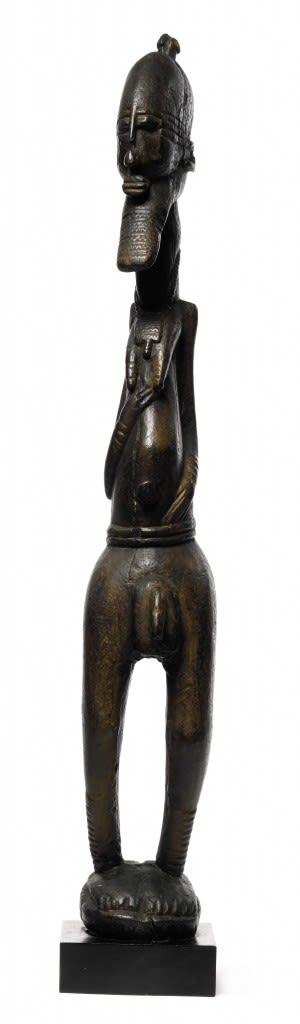 Dogon-Soninke figure. Height: 76,2 cm. Image Courtesy of the Louvre Abu Dhabi. Photo: Sotheby’s.