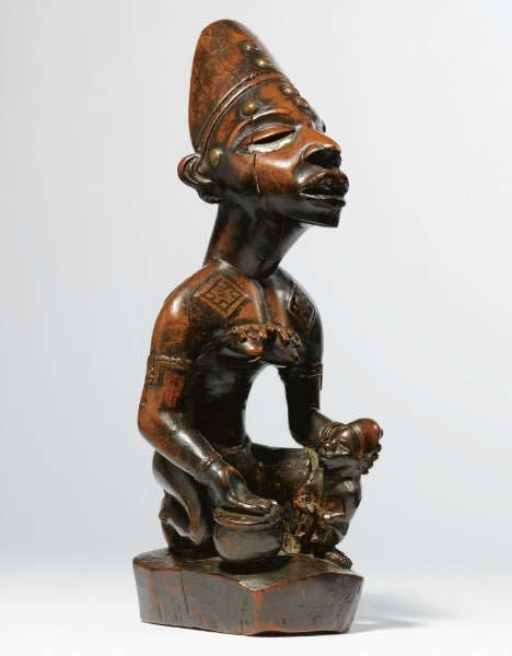 Yombe maternity figure. Height: 28 cm. Image courtesy of Sotheby’s.